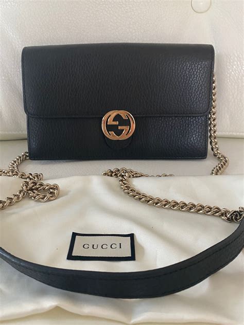 gucci interlocking g chain wallet|Gucci small wallet on chain.